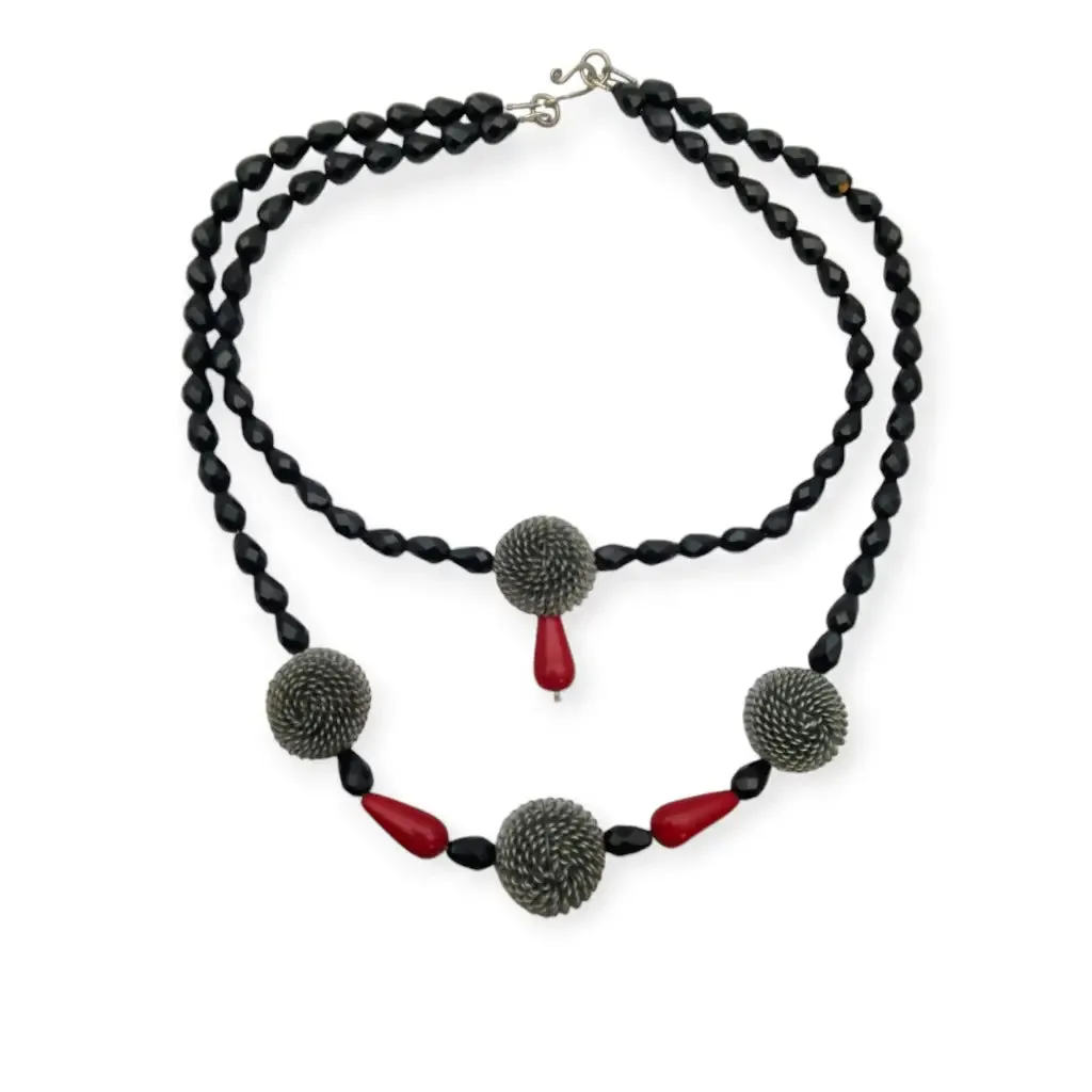 Art Deco choker necklace in black, red and silver with metallic pompoms.