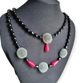 Art Deco choker necklace in black, red and silver with metallic pompoms.