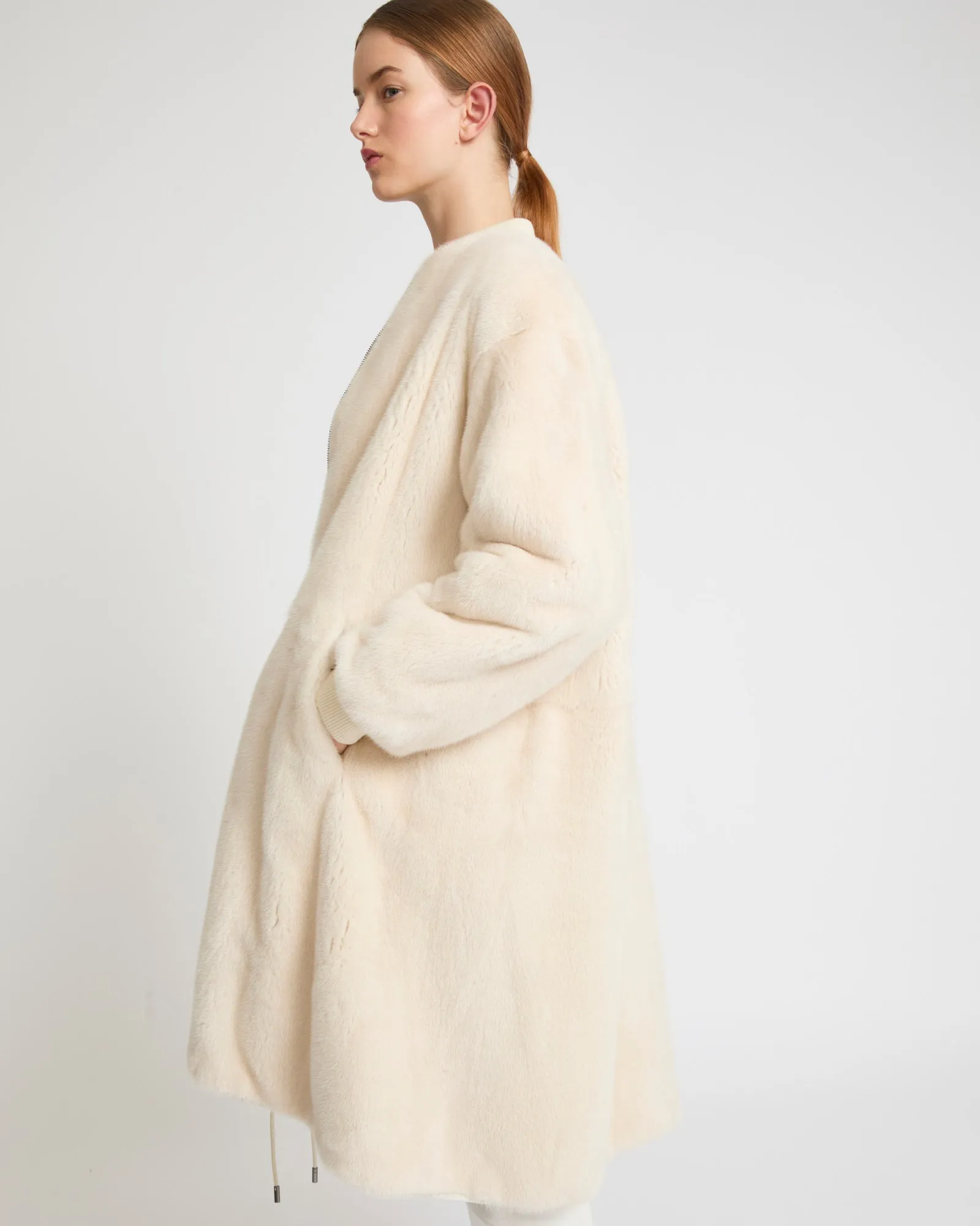 Reversible bomber parka in water-repellent technical fabric and long-haired mink