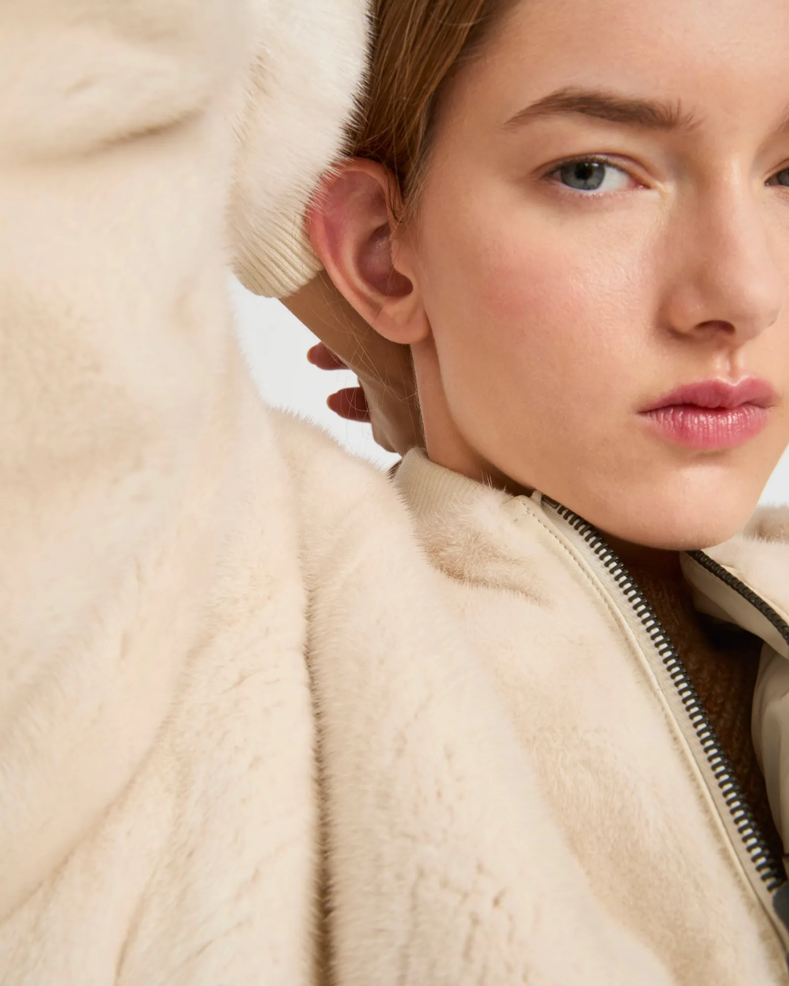 Reversible bomber parka in water-repellent technical fabric and long-haired mink